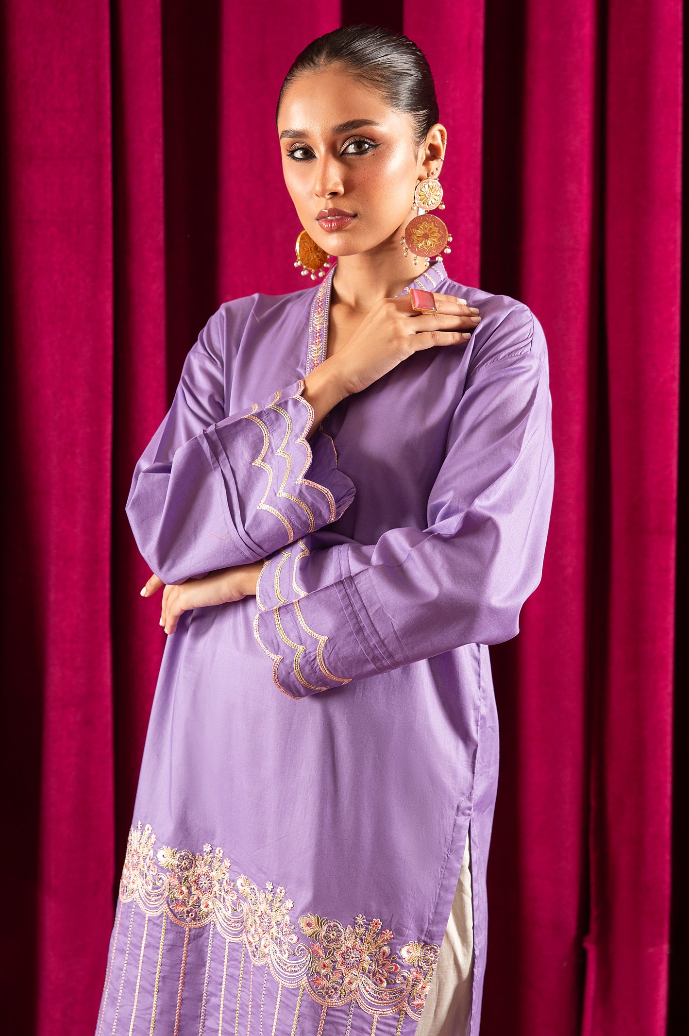 Purple Embroidered Kurti From Diners