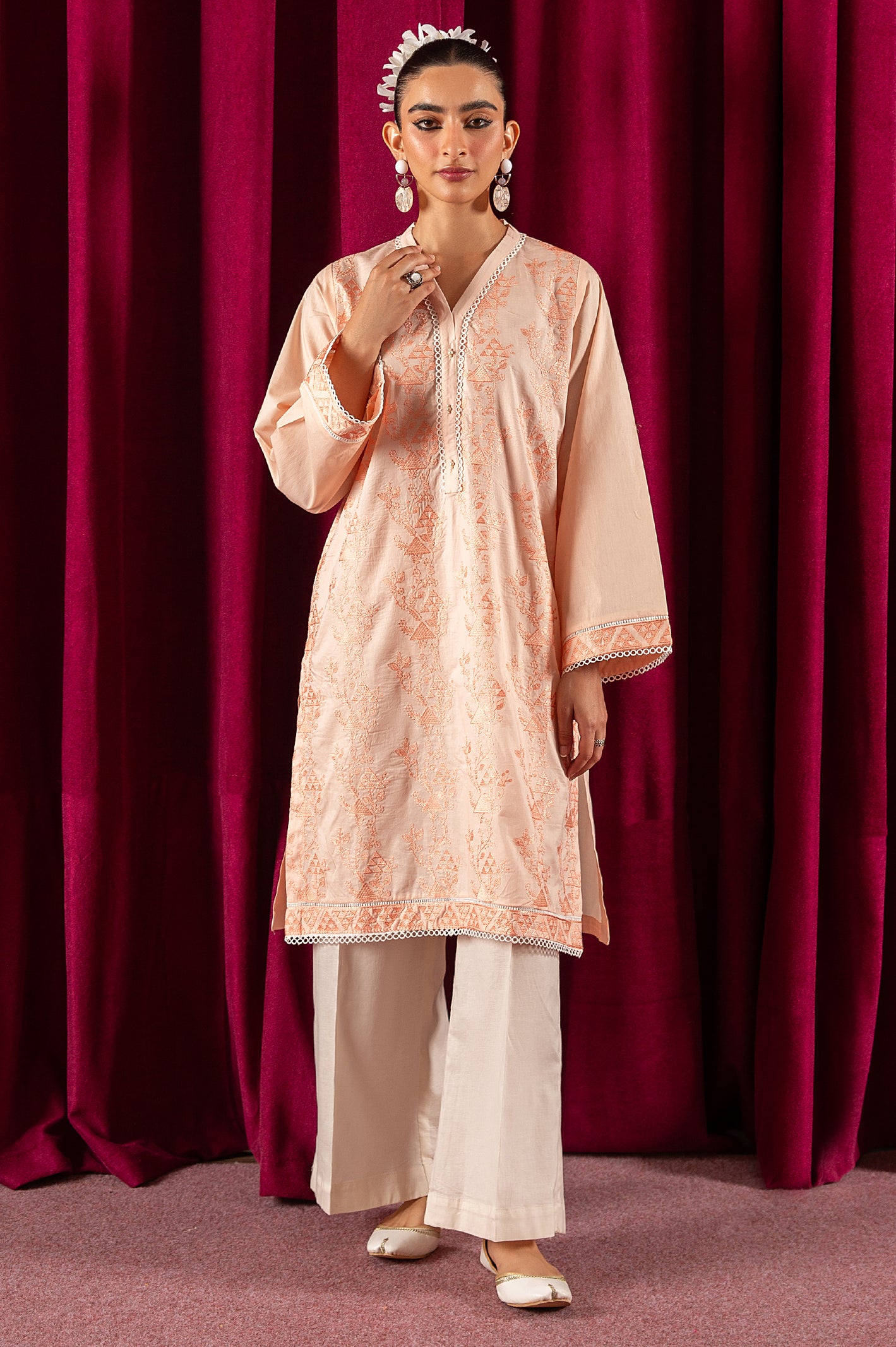 Peach Embroidered Kurti From Diners