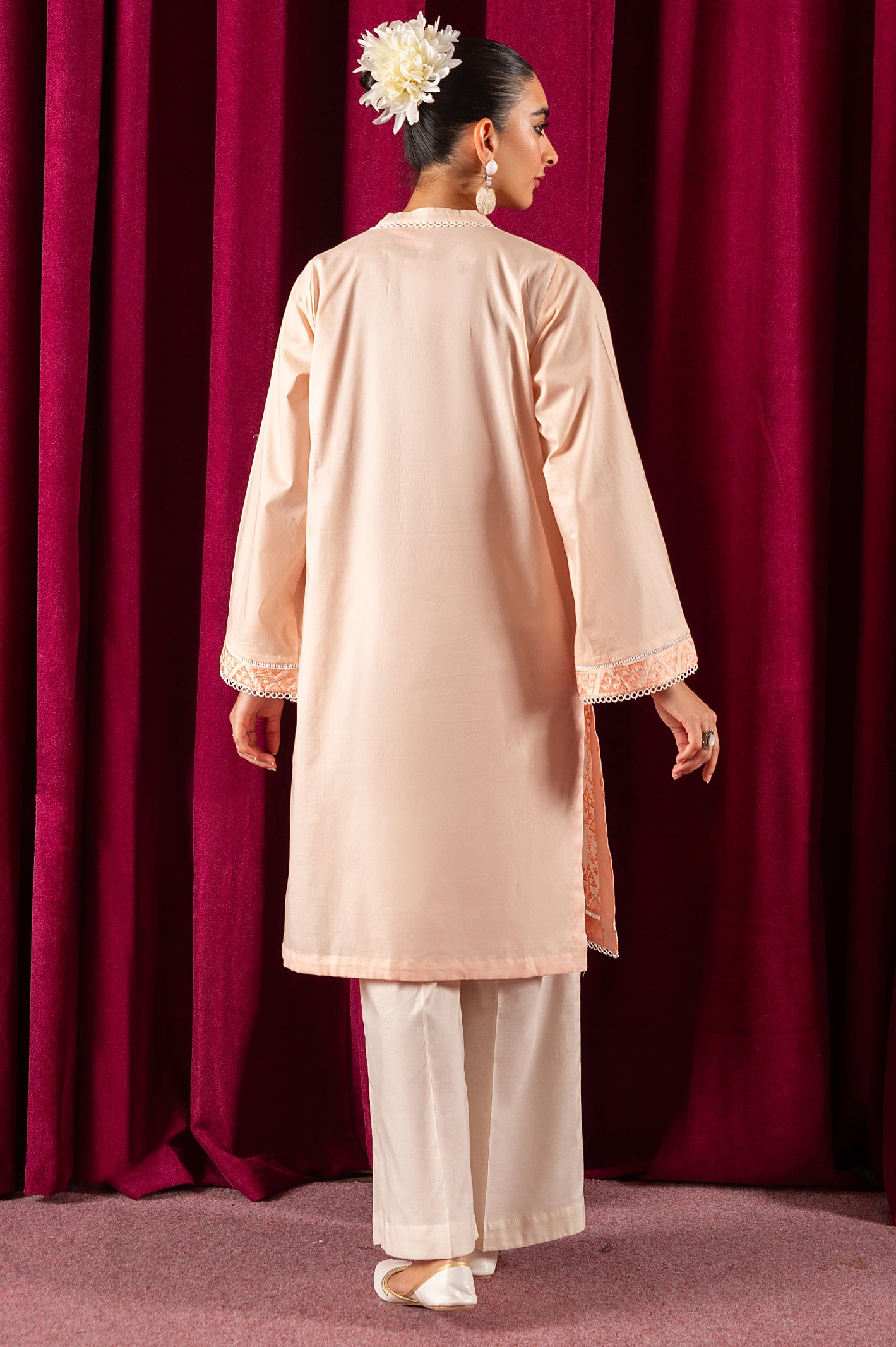 Peach Embroidered Kurti From Diners