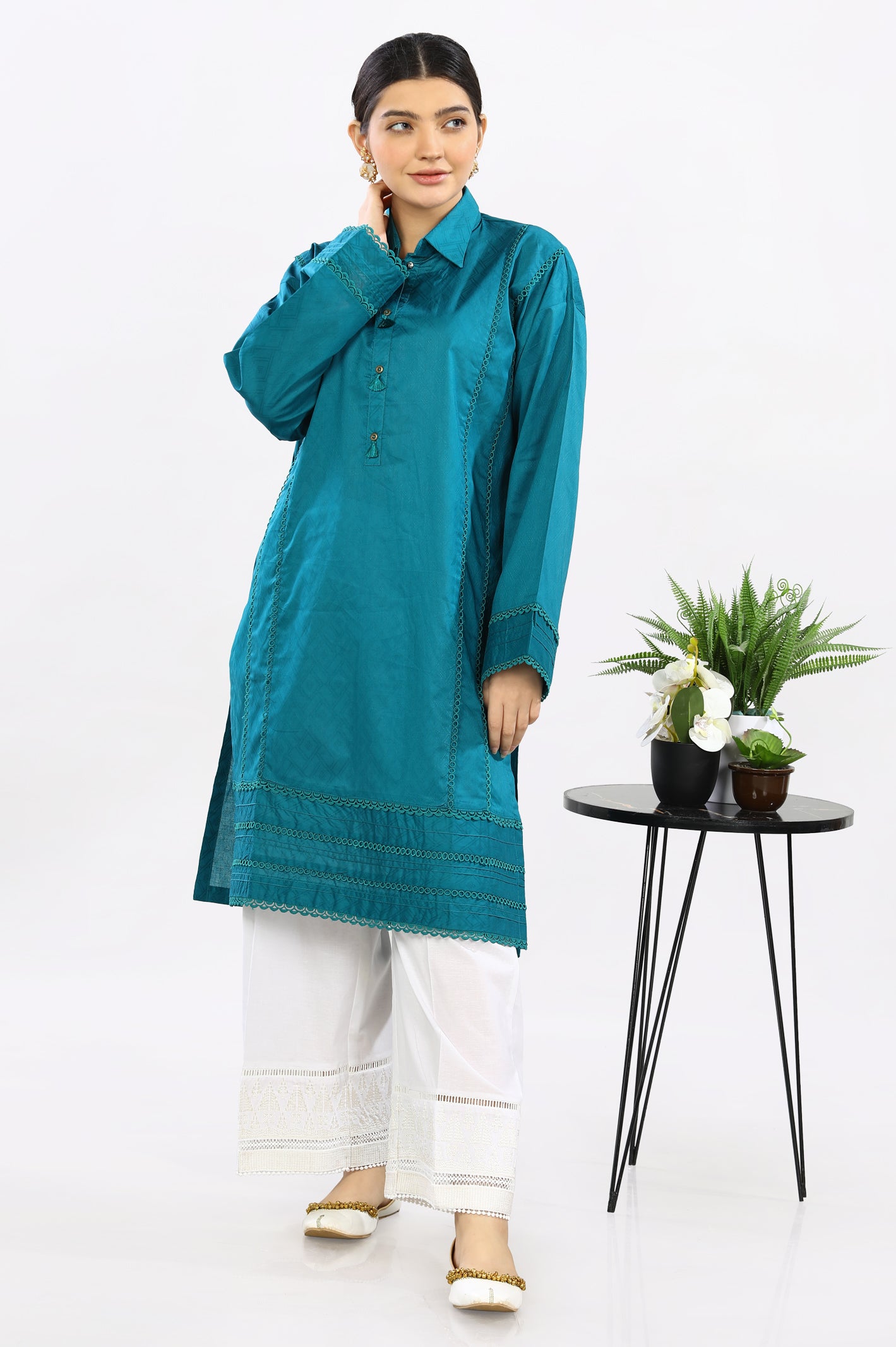 Solid Teal Jacquard Kurti From Diners